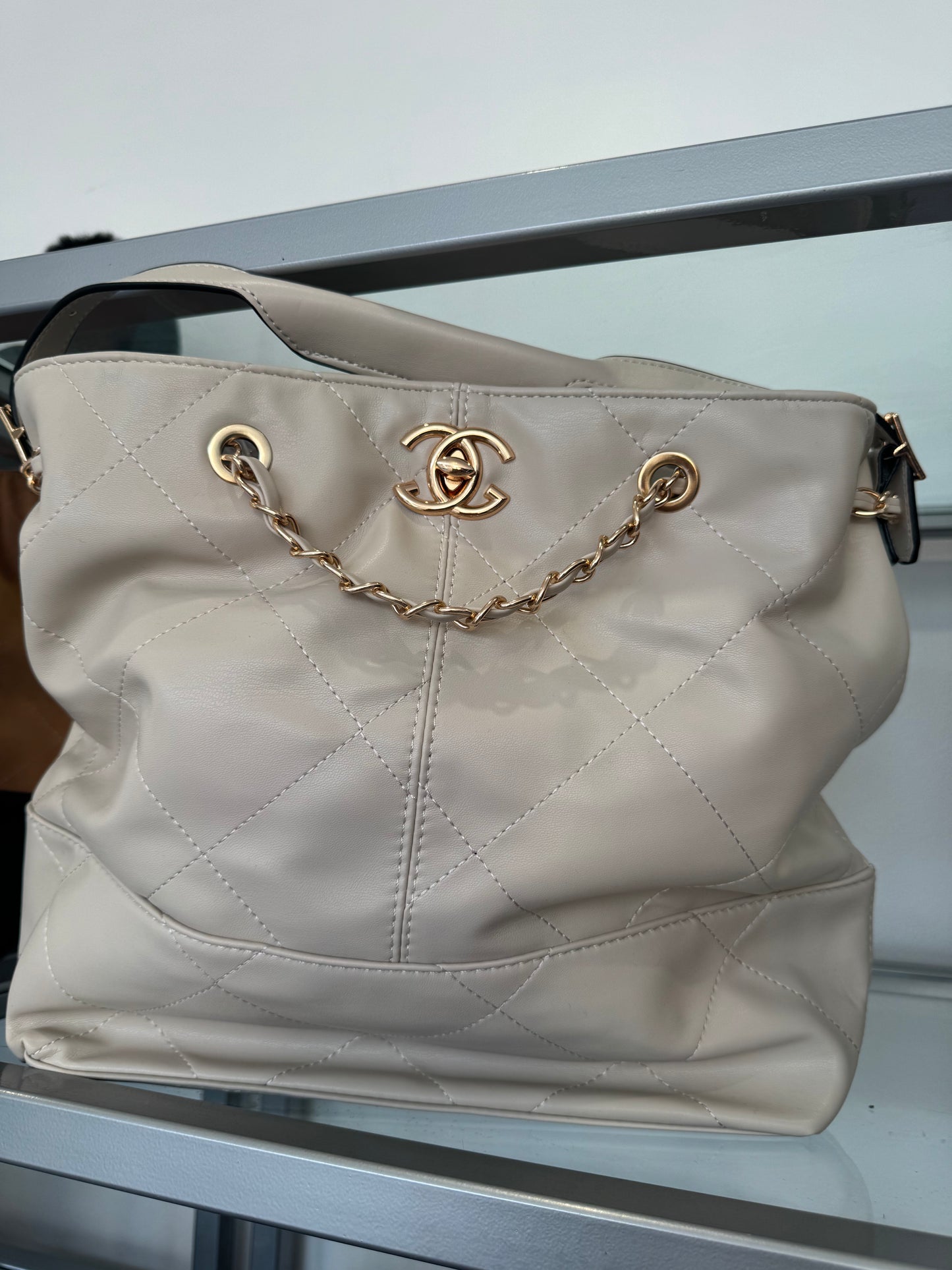 Quilted faux leather oversized CHANGE BAG