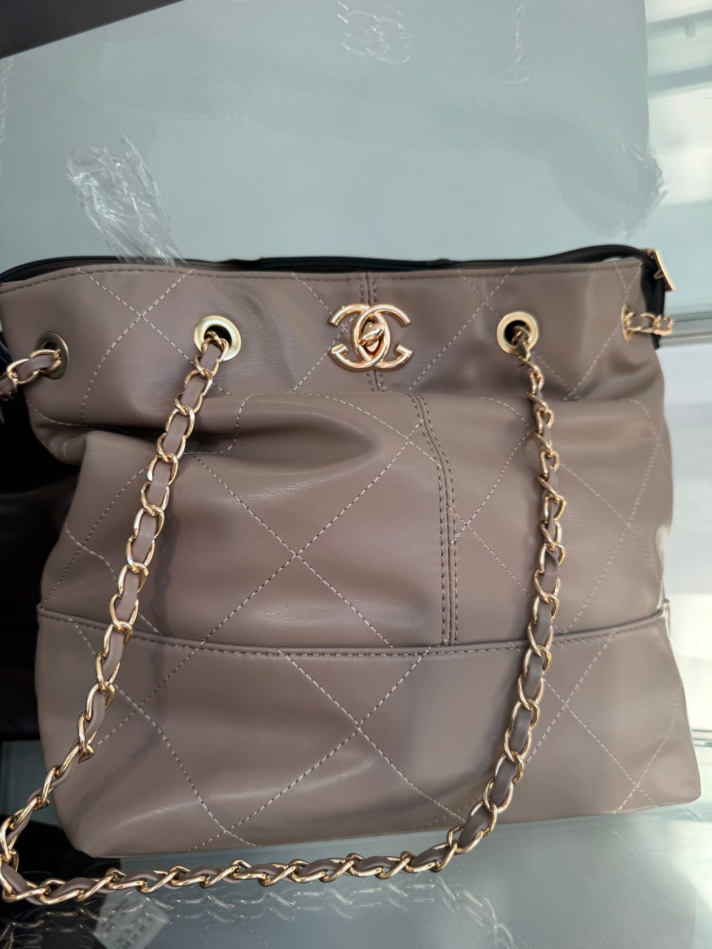 Quilted faux leather oversized CHANGE BAG